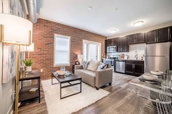 Living Room With Kitchen Area at The Foundry, South Bend, 46617